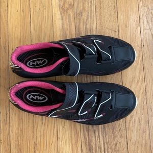 Pink and black spin shoes